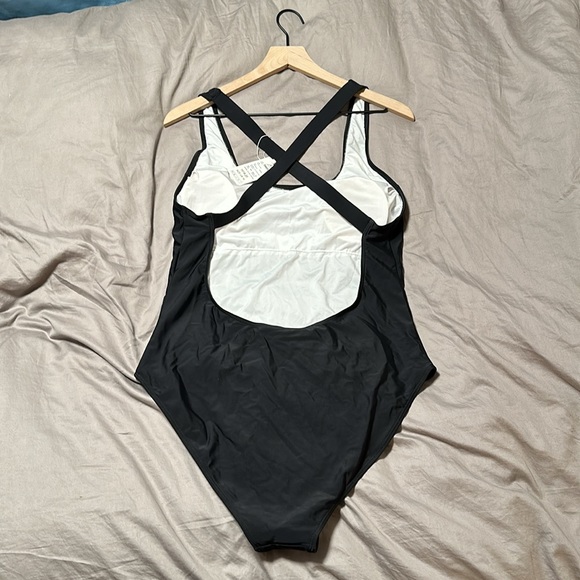 Never worn awesome swimsuit. It didn’t fit me, I have the size that did. 😊 - Picture 5 of 6